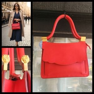 Thale Blanc‎ Elegant Red Handbag with Gold Accents